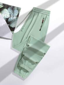 1pc Women's Lightweight Ice Silk Sports Pants, Breathable Quick-Dry, With Ankle Cuffs, Drawcord Waist, Zipper Pockets, Suitable For Outdoor Activities And Casual Walking