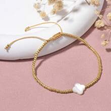 1 Stück legeres minimalistisches Perlen-Armband mit 4-Blatt Klee und Muschel, verstellbar, geeignet für den täglichen Gebrauch von Frauen und für den Urlaub, tolles Geschenk für den Geburtstag