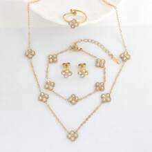 Conjunto de joyas de acero inoxidable 316L con flores doradas incrustadas de piedras de circonita, incluyendo collar, pendientes, pulsera y anillo, un conjunto de joyas para niñas que no se desvanece