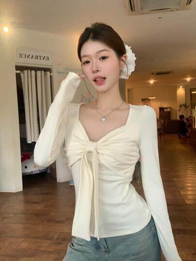 女式蝴蝶结装饰长袖紧身圆领 T 恤，简约风格，春季