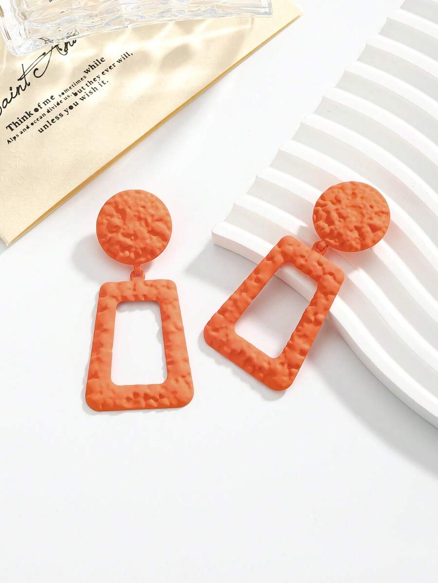 1 par de brincos geométricos minimalistas e modernos em laranja