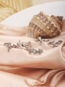 Juego de 5 anillos abiertos de acero inoxidable con diseños de vida marina como concha, estrella de mar y delfín, unisex