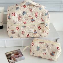 1个米色绗缝兔子化妆包。红色蝴蝶结装饰，大容量，可收纳护肤品、首饰、文具、卫生巾、耳机，也可作钱包使用。是送给女学生、节日、生日、圣诞节、情人节、旅行必备、夏季返校季、女士旅行化妆包的理想之选。 - 米色 - 查看 3