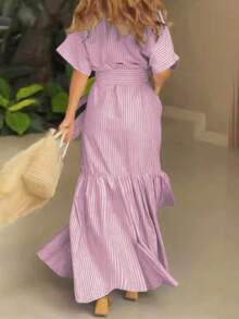 女士夏季休闲风格，时尚优雅，条纹翻领腰带和前开长裙适合毕业装。