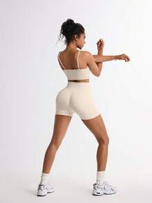 TCVC Set de 2 piese sutien sport + pantaloni scurți pentru femei, fără cusături, culoare solidă, foarte elastici, transparenti, rezistenti la uzură, acoperire ridicată, absorbție a șocurilor, încrețituri, căptușeală independentă, bretele subțiri sexy, spate frumos, talie înaltă, control al abdomenului, șolduri piersică, pantaloni scurți de ciclism versatili, culoare solidă, potriviți pentru alergare, yoga, sală de sport, activități în aer liber, timp liber, recreere - alb - Vizualizare 3
