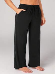 Calça feminina plus size, perna larga, reta, casual, com bolsos, cintura com cordão solto, 1 peça