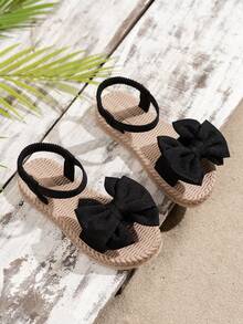 新款夏季黑色蝴蝶结凉鞋，女童款，编织厚底，单带踝带，波西米亚风罗马鞋，编织图案/编织厚底，厚底增高，不磨脚，柔软舒适，适合夏季、户外活动、搭配连衣裙、通勤、购物、海滩度假等场合。 - 黑色 - 查看 2
