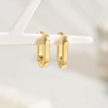 1 par de pendientes de aro con forma geométrica en U, textura de metal dorado liso, diseño minimalista, versátil para uso diario, con un sutil y elegante ambiente, apropiado para el trabajo, ocasiones casuales y de commute