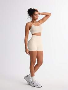 TCVC Set de 2 piese sutien sport + pantaloni scurți pentru femei, fără cusături, culoare solidă, foarte elastici, transparenti, rezistenti la uzură, acoperire ridicată, absorbție a șocurilor, încrețituri, căptușeală independentă, bretele subțiri sexy, spate frumos, talie înaltă, control al abdomenului, șolduri piersică, pantaloni scurți de ciclism versatili, culoare solidă, potriviți pentru alergare, yoga, sală de sport, activități în aer liber, timp liber, recreere - alb - Vizualizare 5