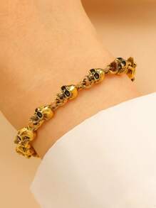 1 pièce Bracelet vintage gothique à tête de mort dorée sombre, accessoire de mode pour femmes, convient pour le port quotidien et comme cadeau d'Halloween