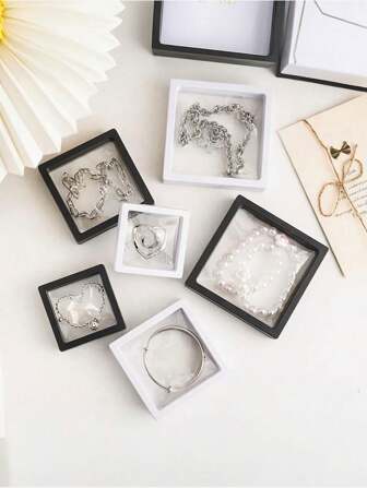 10 st flytande displayfodral PE-film svart smyckesförvaringslåda 3D-förpackningsfodral ädelstensfritt stativ flytande ram membran ring örhängen halsband display för utmaningsmynt medaljonger smycken