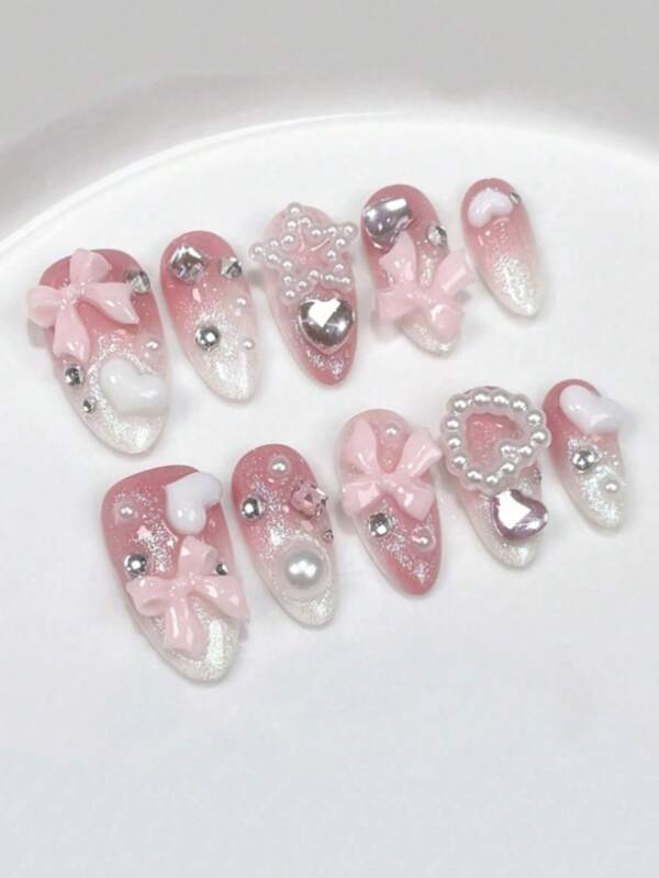 Cute, Sweet And Pure, 10-Piece Set, Medium-Length Almond-Shaped Blush, Gradient, Fine And Shiny, Pink Three-Dimensional Bow, Heart, Pearl Five-Pointed Star, Making The Girl Look Fair And Sweet Wearing Armor. It Is A High-End Nail Art Set Worn Daily At Festivals