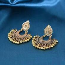 Nouvelles boucles d'oreilles bohémiennes à pompons pour femmes