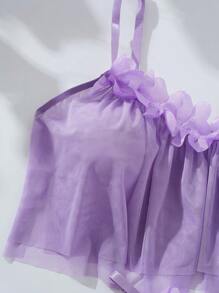 Lingerie sexy con sottoveste in rete trasparente ricavata, design con collo alto e schiena scoperta. La camicia da notte in rete con dettagli in pizzo è una lingerie seducente.