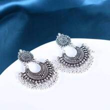 Nouvelles boucles d'oreilles bohémiennes à pompons pour femmes