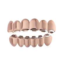Dientes falsos enchapados en oro, joyería para dientes de hip hop suave para hombres y mujeres