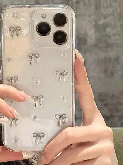 蝴蝶结简约树脂蝴蝶结装饰手机壳，兼容 15 Pro Max、 14 Pro，新上市的 13 Pro也兼容，创意透明款兼容 11、12、14，防摔高端全包手机壳，防水防震防刮。