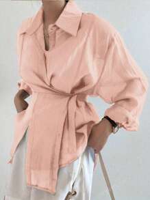Blusa casual y de moda de color liso con hombros sueltos y anudada en la parte delantera para primavera y otoño