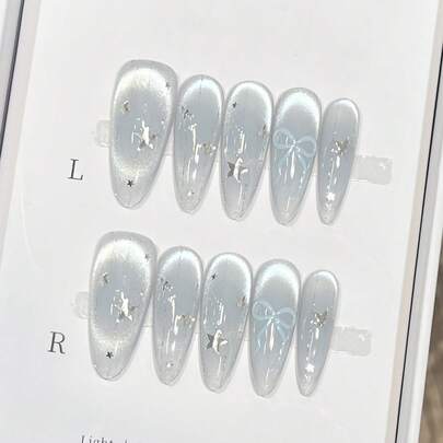 10颗冰蓝色玻璃珠猫眼腮红蝴蝶结星星手工亚克力按压式美甲片，长杏仁形假指甲，含果冻胶和指甲锉，DIY美甲用品，适合情人节、音乐节、学校旅行等场合。