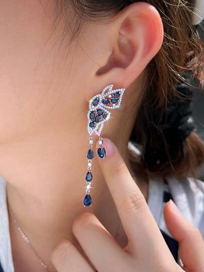 1 par de pendientes simétricos de mariposa con borlas en forma de gota de agua, con circonita cúbica de color azul real para mujeres, bodas, compromisos y fiestas