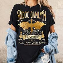 Camiseta de algodón 220G de Ridoc Gamlyn, Quest, O Storm Merch, Fourth Wing, Basgiath War College, Dragon Rider Empyrean Bookish con una combinación duradera y suave de estilos retro y minimalistas, perfecta para uso diario, trabajo, salidas de fin de semana o descanso - regalo ideal para él o ella, cumpleaños, aniversario o simplemente porque sí - Negro - Ver 1