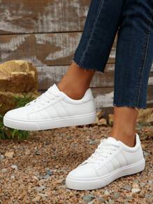1 par de zapatillas deportivas casuales blancas de mujer con cordones, con diseño de rayas, puntera redonda y versátiles, adecuadas para uso casual y skateboarding
