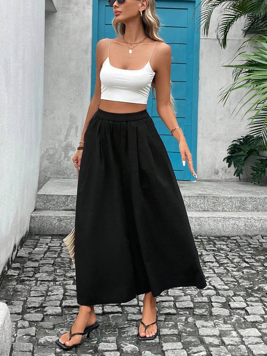 Spodnie typu kuloty z wysokim stanem, w jednolitym kolorze, z poliestru, szerokie nogawki, odpowiednie na letnie codzienne noszenie - Czarne - Zobacz 1