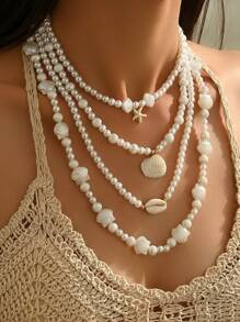 Conjunto de 4 collares elegantes y vintage con perlas falsas, estrellas de mar, conchas y vieiras de múltiples capas, adecuados para bikini, playa y uso diario