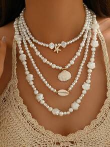 Conjunto de 4 collares elegantes y vintage con perlas falsas, estrellas de mar, conchas y vieiras de múltiples capas, adecuados para bikini, playa y uso diario