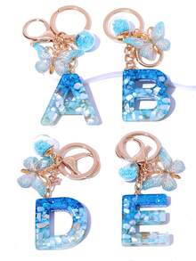 1 szt. Kreatywny, ręcznie robiony motyl, ozdobny brelok z literą z kryształową szklaną kulką w kształcie gwiazdy, zawieszki do torebki i portfela, torba z ozdobnym brelokiem z literą, brelok do kluczyków samochodowych dla kobiet, brelok zapobiegający zgubieniu, prezent na powrót do szkoły dla uczniów, nauczycieli, kolegów z klasy - Niebieski i biały - Zobacz 3