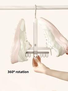 1 Stück vielseitig drehbarer Doppelhaken Schuhständer für Zuhause und Terrasse, windgeschützter Schuhaufhänger ideal für Studentenwohnheime, effiziente Sandalentrocknung Rack perfekt zum Organisieren von Schuhen, stilvolles und platzsparendes Design für Eingangsbereiche, Balkone und Außenbereiche, unverzichtbare Aufbewahrungslösung für saisonale Schuhe, verbessert die Wohndekoration und hält Schuhe ordentlich und zugänglich