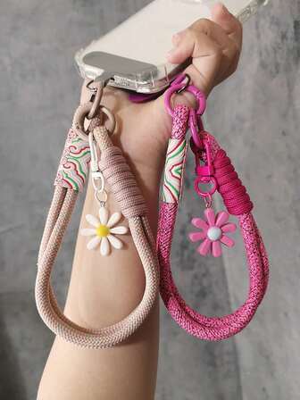1 pieza Soporte para teléfono con correa de muñeca con colgante de flor, con cordón trenzado y detalles de margarita, cordón para teléfono anti-pérdida unisex adecuado para viajes y uso al aire libre