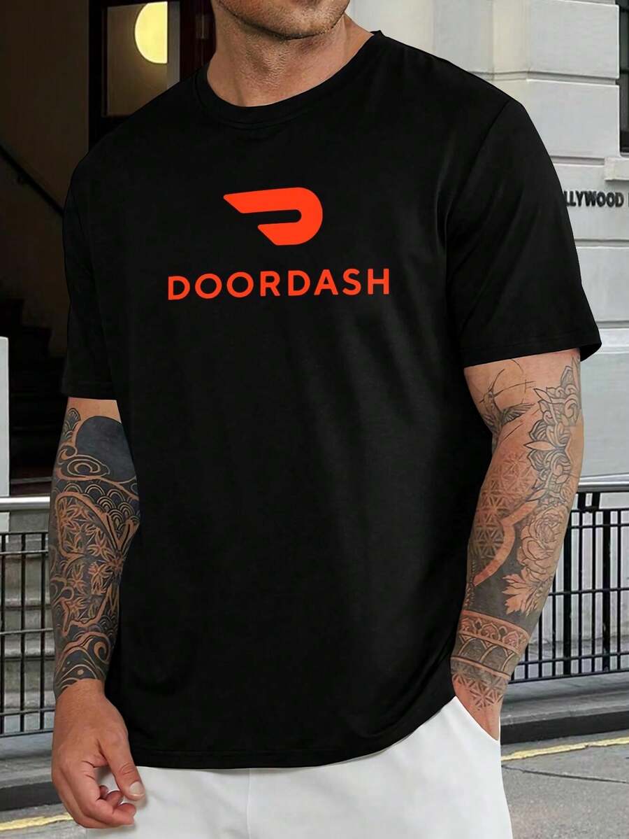 Camiseta negra de manga corta oficial de DoorDash - Camiseta de cuello redondo para hombre y mujer. Cómoda para el uso diario. Mercancía para repartidores de DoorDash. Ropa de DoorDash. Regalo para marido - Negro - Ver 1