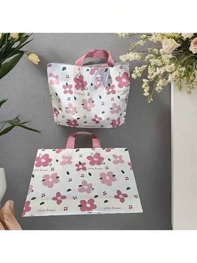 20 个桃色和摩卡色花卉印花手提袋 - 厚实、防水、可重复使用，带粉色手柄 - 非常适合礼品包装、零售展示、服装店、珠宝和服装购物、日常携带 | 可爱的花卉印花设计