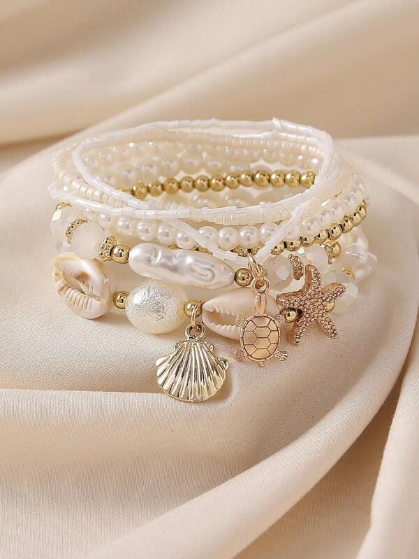 Set de 7 piezas de pulseras con capas de conchas marinas, perlas y cuentas con forma de estrella de mar, diseño apilable bohemio para mujer, para usar en la playa, ocasiones casuales, con patrones aleatorios de conchas, gran idea de regalo para fiestas, bodas, novias, accesorios de moda y joyería, de vuelta a la escuela