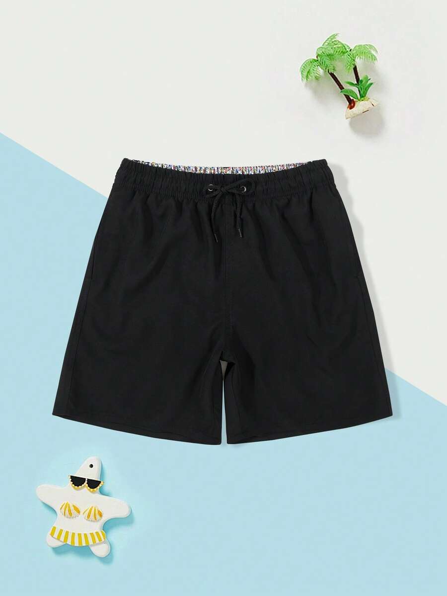 Boy Solid Color Drawstring Waist Swim Trunks
