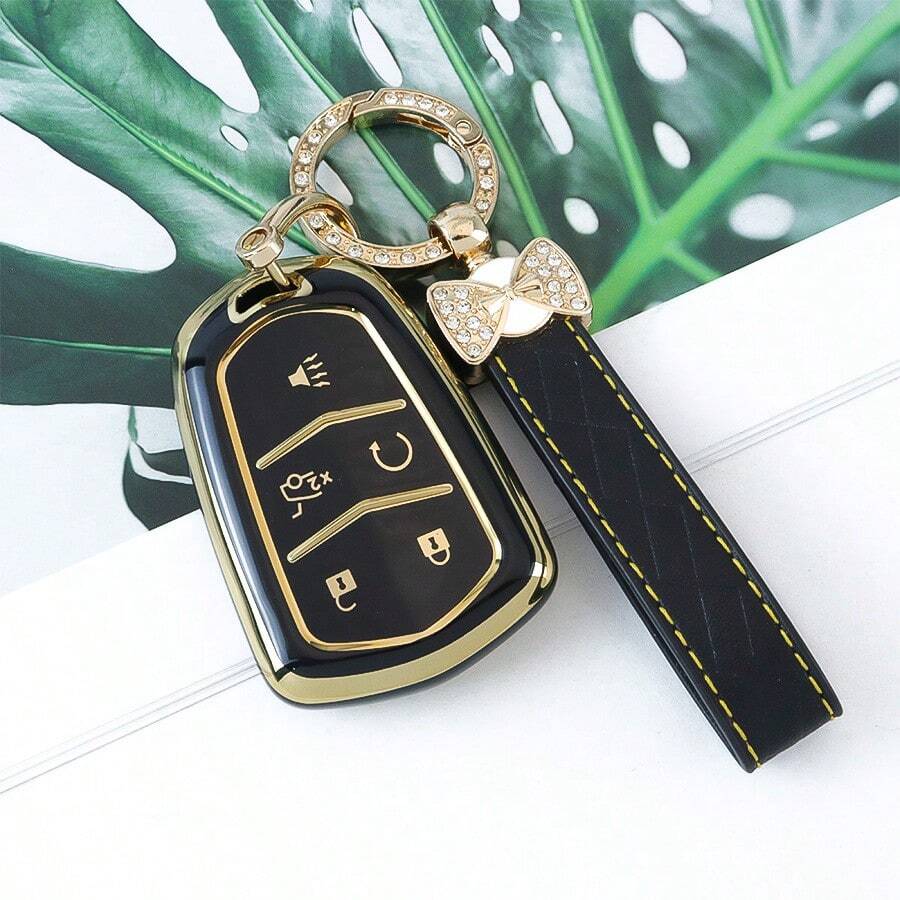 5键汽车钥匙套，TPU材质，金色镶边，适用于凯迪拉克CT4、CT5、ATS、XT6等车型，时尚设计，带钥匙扣，女孩款