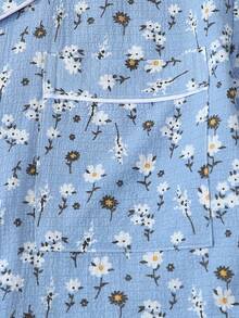 2 pièces Ensemble de pyjama femme avec Top à manches courtes avec boutons, imprimé fleurs de marguerite et short nœud, poches. Confortable pour le port à la maison, printemps/été - Bleu azur - Voir 4