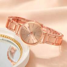 2 piezas Juego de lujo dorado Reloj de mujer Brazalete de damas Pulsera de acero inoxidable LOVE como regalo para mujeres