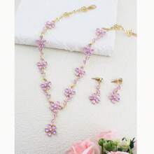 Conjunto de collar y aretes de joyería con flores de margarita moradas, adecuado para mujeres en primavera y verano