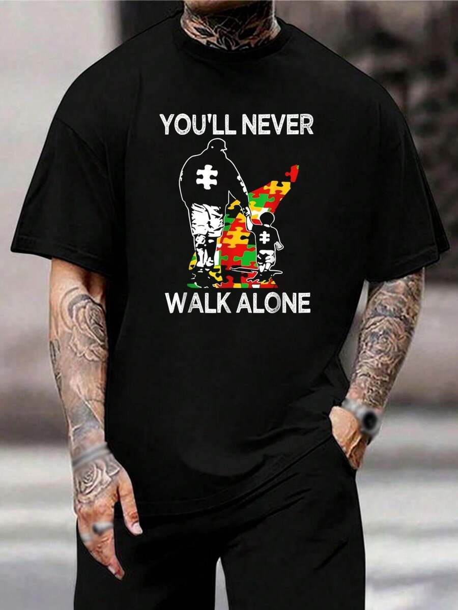 Camiseta de Concientización sobre el Autismo 'Nunca Caminarás Solo' - Apoya el Mes de Concientización y Aceptación del Autismo - Regalo Perfecto para Padres, Profesores, y Apoyadores - Camiseta Unisex de Corte Cómodo - Camiseta de Papá con Autismo - Negro - Ver 1