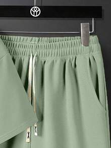 青少年印花吸汗透气纯色圆领短袖T恤短裤套装，夏季休闲