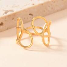 Un anello in acciaio inossidabile nicchia e creativo, con linee irregolari e aperture regolabili, adatto per le donne da indossare quotidianamente o a banchetti festivi