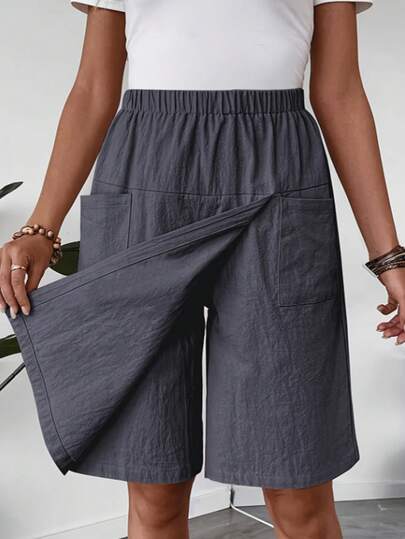 Women's Solid Color Elastic Waist Casual Loose Leg Shorts With Pockets