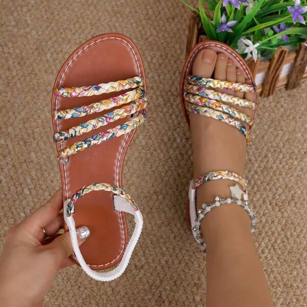 Women's Bohemian Flat Sandals Featuring Handwoven Floral Fabric Straps. These Sandals Offer Comfort And Breathability, Making Them Perfect For Casual Wear And Suitable For Various Occasions.