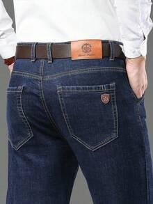 男士弹力修身直筒商务休闲牛仔裤，斜插口袋设计，适合日常穿着