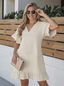 Vestido de mujer de manga corta con volantes sueltos con cuello en V de color liso