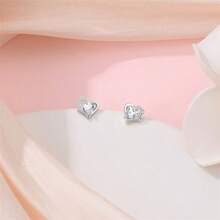 A Pair Of S925 Sterling Silver Diamond Stud Earrings Collection, The Diamond Of Love: Sterling Silver And Diamond Stud Earrings Fashion Collection
