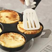 Ein 4-Tassen Antihaft-Gusseisen-Pfanne, geeignet zum Braten von Eiern, Pfannkuchen und Burgern - eine vielseitige stromfreie Frühstückspfanne ideal zum Braten, Andünsten und Zubereiten von Pizza-Desserts, perfekt für den Einsatz zu Hause und im Restaurant.