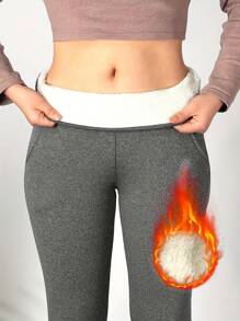 1 pieza Leggings cómodos y abrigados de plumón para la nieve, leggings casuales elásticos con bolsillos, de cintura alta, ropa de mujer